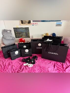 CHANEL Black with White Camellia Accent Paper Bags